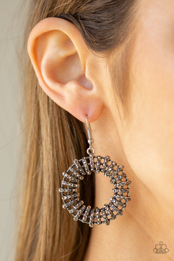 Paparazzi Girl Of Your GLEAMS - Silver - Earrings
Dainty hematite rhinestone encrusted frames stack along a bold silver hoop, creating daring dazzle. Earring attaches to a standard fishhook fitting.