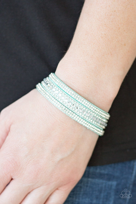 Paparazzi Harlem Hustle - Green - Bracelet
Varying in size, glittery white rhinestones are encrusted along a Spearmint suede band that has been spliced into three glittery strands. Features an adjustable snap closure.
