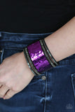 Paparazzi Heads Or Mermaid Tails - Purple-Silver - Bracelet
Infused with strands of smoky hematite rhinestones and dainty metallic accents, row after row of shimmery sequins are stitched across the front of a spliced black suede band. Bracelet features reversible sequins that change from purple to silver. Features an adjustable snap closure.
