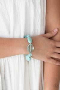 Paparazzi I Need A STAYCATION - Blue - Bracelet
Featuring glassy, opaque, and solid finishes, an array of Blue Radiance faux stone beads and dainty silver beads are threaded along a stretchy band around the wrist for a boldly colorful fashion.

