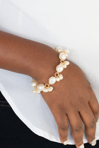Paparazzi Imperfectly Perfect - Gold - Bracelet
Featuring imperfect finishes, clusters of dainty pearly beads and pearly faceted beads delicately link around the wrist, creating a timeless fringe. Features an adjustable clasp closure.
