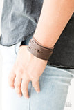 Paparazzi In Or OUTLAW - Brown - Bracelet
Pieces of brown leather are stitched in place across the front of a thick brown leather band for a rugged look. Features an adjustable snap closure.
