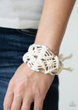 Paparazzi Macram Mode - White - Bracelet - September 2020 Life Of The Party Exclusive
White cording decoratively knots and weaves around an airy silver cuff for a macram inspired look. Knotted around the ends, white tassels flair out from bottoms of the cuff for a wanderlust finish.