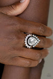 Paparazzi Make Your Trademark - White - Ring - Life of the Party Exclusive - September 2020
A ring of glittery white rhinestones fans out from a dramatically oversized white teardrop rhinestone center, creating the illusion of a floating centerpiece. Features a stretchy band for a flexible fit.