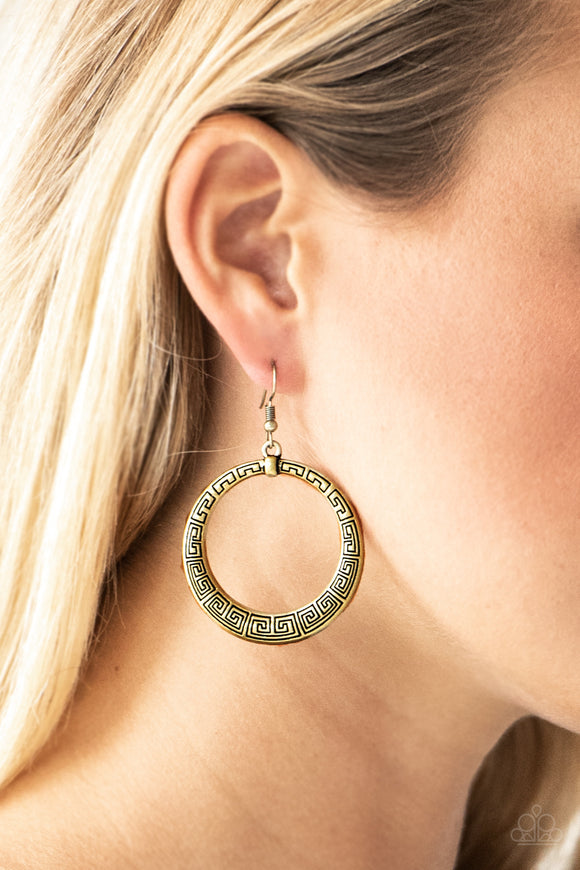 Paparazzi Mayan Mantra - Brass - Earrings
Brushed in an antiqued shimmer, a glistening brass hoop is stamped in dizzying patterns for a tribal inspired look. Earring attaches to a standard fishhook fitting.
