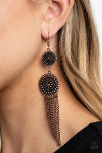 Paparazzi Medallion Mecca - Copper - Earrings
Dotted with topaz rhinestone centers, two studded copper floral frames give way to an antiqued copper chain fringe for a whimsically stacked look. Earring attaches to a standard fishhook fitting.