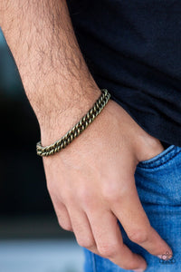 Paparazzi Next Man Up - Brass - Bracelet
Brushed in an antiqued finish, a faceted brass chain links around the wrist for a rustic look. Features an adjustable clasp closure.

