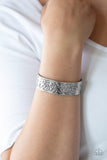 Paparazzi Read The VINE Print - Silver - Bracelet
Brushed in an antiqued shimmer, vine-like filigree is embossed across the front of the a thick silver cuff for a whimsical look.
