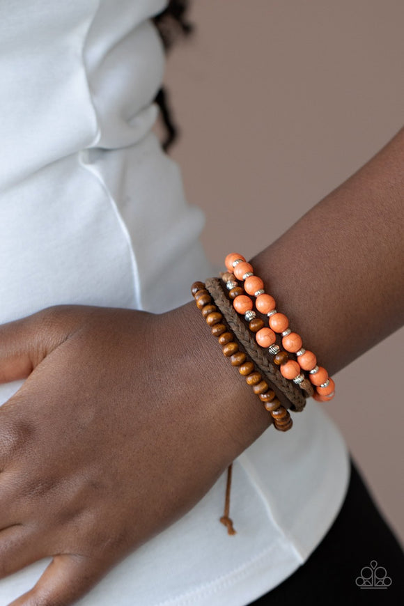 Paparazzi Renewable Energy - Orange - Bracelet
Featuring orange stones, dainty silver accents, and earthy wooden beads, mismatched strands of brown cording and braided suede bracelets stack across the wrist for an earthy look. Features an adjustable sliding knot closure.
