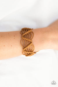 Paparazzi Rise To The Bait - Light Brown - Bracelet
Brown twine knots around shiny brown cording, creating a netted pattern around the wrist. Features an adjustable sliding knot closure.

Always nickel and lead free.