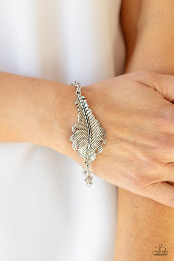 Paparazzi Rustic Roost - Silver - Bracelet
Etched and embossed in lifelike detail, a rustic silver feather centerpiece attaches to an antiqued silver chain around the wrist. Features an adjustable clasp closure.
