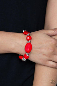 Paparazzi Savor The Flavor - Red - Bracelet
Brushed in a faux-rock finish, a collection of faceted red beads and shimmery silver links are threaded along a stretchy band around the wrist for a flavorful look. 
