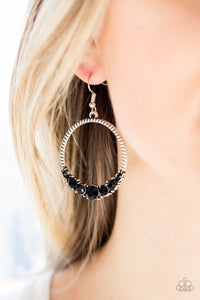 Paparazzi Self-Made Millionaire - Black - Earrings
The bottom of a textured silver hoop is encrusted in glittery black rhinestones for a glamorous look. Earring attaches to a standard fishhook fitting.
