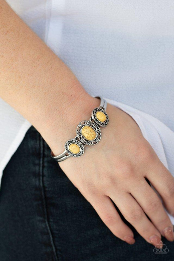 Paparazzi Stone Sage - Yellow - Bracelet
Sunny yellow stones are pressed into the centers of three ornate silver centers atop a dainty silver cuff for a seasonal flair. 