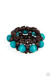 Paparazzi Tropical Temptations - Blue - Bracelet Oversized blue wooden beads, rustic brown wooden beads, and dainty wooden discs are ornately threaded along braided stretchy bands around the wrist, creating a summery centerpiece.