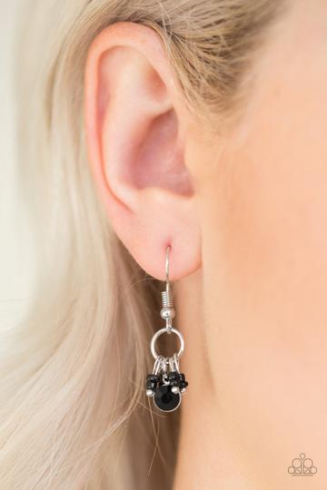 Paparazzi Twinkling Trinkets - Black - Earrings
Black seed beads are threaded along metallic rods as they swing from the bottom of a dainty silver hoop. A solitaire black rhinestone swings from the bottom for a refined finish. Earring attaches to a standard fishhook fitting.