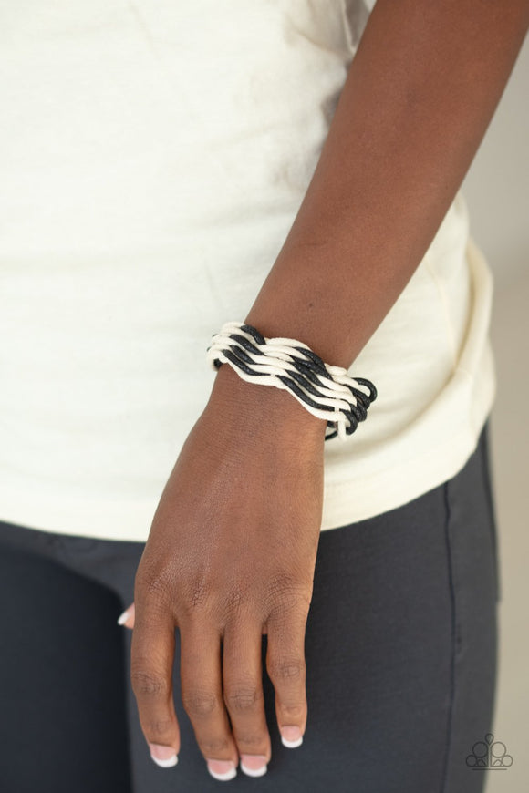 Paparazzi WEAVE High And Dry - Black - Bracelet
Strands of white and black cording ornately weave across the wrist, creating an earthy braid. Features an adjustable sliding knot closure.
