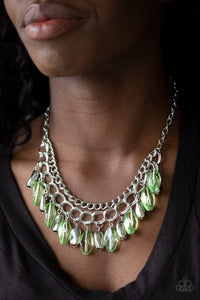 Paparazzi Spring Daydream - Green Infused with a row of thick silver chain, faceted silver and glassy green beads swing from the bottom of ornate silver links, creating a vivacious fringe below the collar. Features an adjustable clasp closure.

