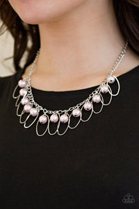 Paparazzi Party Princess - Pink Pearly pink beads and shimmery silver hoops trickle from the bottom of a glistening silver chain, creating a fierce fringe below the collar for a timeless look. Features an adjustable clasp closure.

