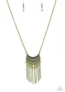Paparazzi Happy Is The Huntress- Brass Radiating in linear textures, a glistening brass crescent swings from the bottom of a lengthened brass chain. Shimmery brass chains and flared brass beading swings from the bottom of the tribal inspired pendant, creating a flirtatious fringe. Features an adjustable clasp closure.

