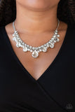 Paparazzi Knockout Queen - White - 2020 EMP Exclusive
A glamorous collection of bubbly white pearls and exaggerated white teardrop gems dangle from a bold strand of white rhinestones, creating a knockout fringe below the collar. Features an adjustable clasp closure.