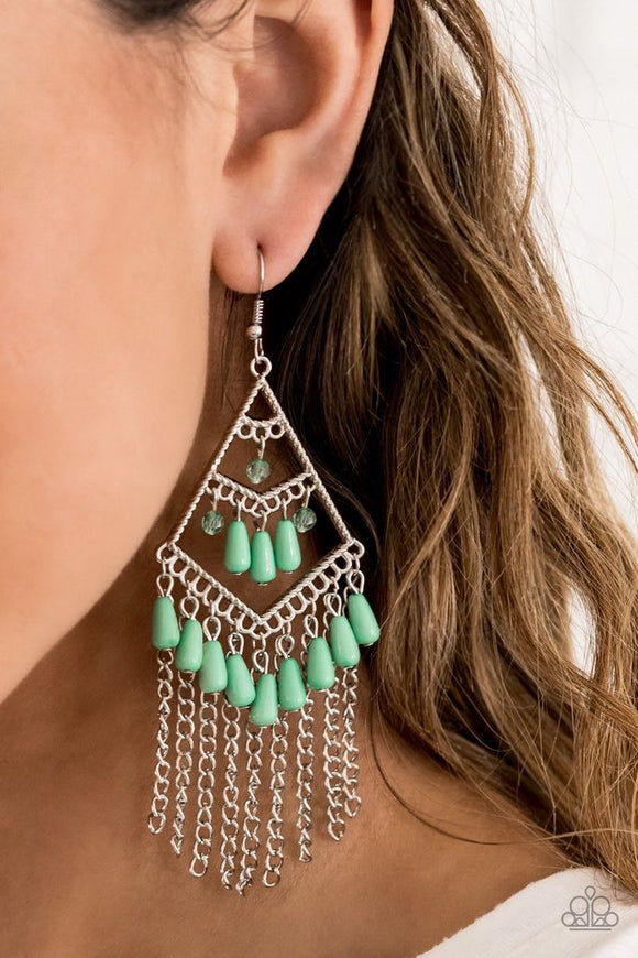 Paparazzi Trending Transcendence - Green - Earrings - 2020 Summer Pack Exclusive
Dainty green crystal-like and teardrop beads cascade from three tiers of a silver kite-shaped frame. Shimmery silver chains stream from the bottom of the frame, adding movement to the colorful fringe. Earring attaches to a standard fishhook fitting.